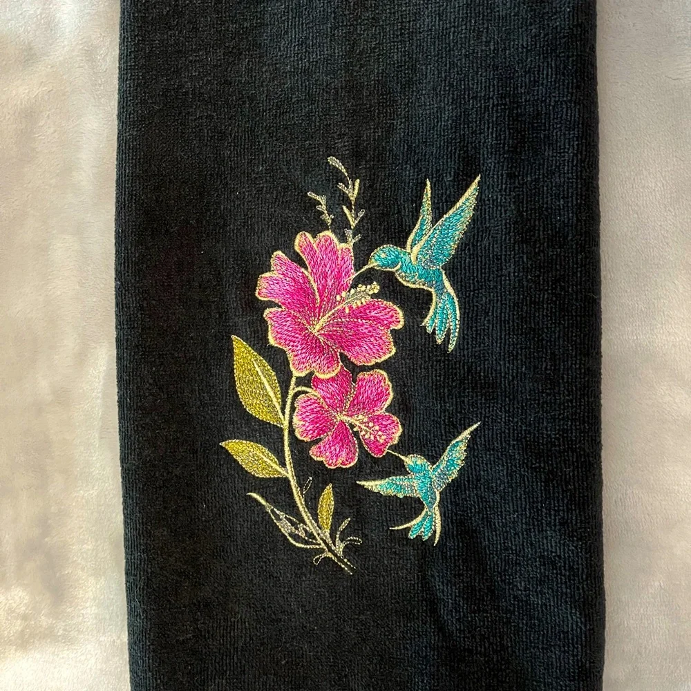 Handcrafted floral hummingbird/butterfly theme embroidered pair of hand towels.